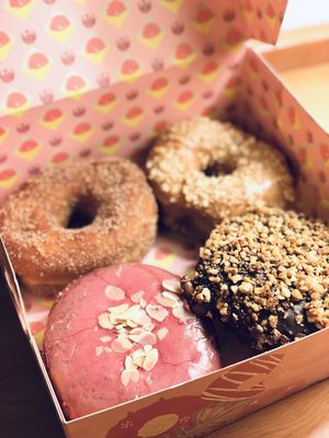 Charity donut, sugar cinnamon, salted caramel hazelnut, cherry amaretto  at Brammibal's Donuts - Maybachufer in Berlin