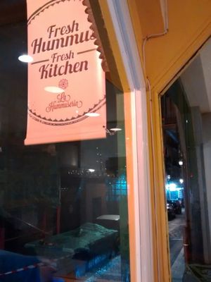 sign at La Hummuseria in Madrid