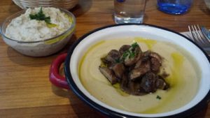 Hummus con champiñon y tapa de berenjena at La Hummuseria in Madrid