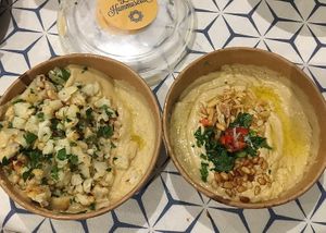 Cauliflower hummus and pine nuts hummus at La Hummuseria in Madrid