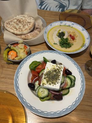 Classic Hummus with pita bread & Greek Salad (not vegan contains dairy)  at La Hummuseria in Madrid