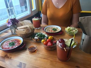 2 hummus, 2 tapas and 2 drinks. at La Hummuseria in Madrid