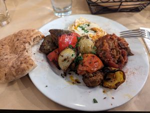 Vegetable skewer with hummus, chunky eggplant, and whole wheat pita at Oren's Hummus in Mountain View