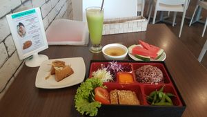 Bento box, dumplings and apple guava juice at Newstart Health Kitchen in Cheras