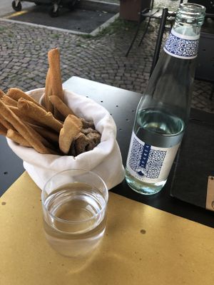 Drinks and bread at Mezzaluna in Turin