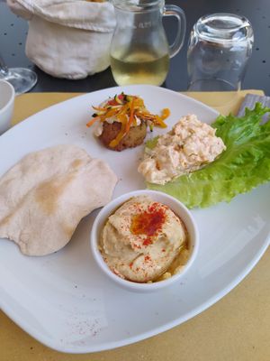 Houmous, piemontaise and quinoa ball at Mezzaluna in Turin