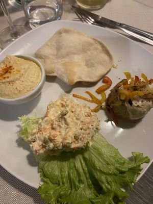 Antipasto misto (humus- insalata russa-tortino di quinoa ) at Mezzaluna in Turin