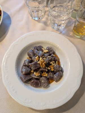 Purple gnocchi at Mezzaluna in Turin