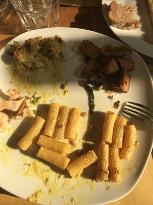 Variety of dishes on the same plate  at Mezzaluna in Turin