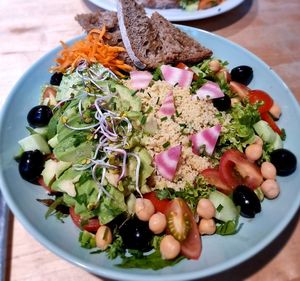 salad with couscous avocado, olives, cucumber, chickpeas, ...  at Books & Brunch in Bruges