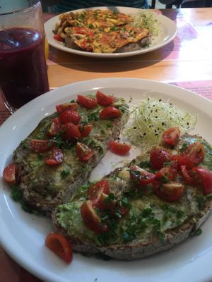 Berry Smoothie and Avo and Tomato on toast - very nice.  at Books & Brunch in Bruges