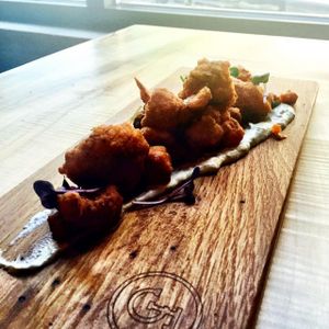 Front Street Cafe - Buffalo Cauliflower Wings with cucumber dill sauce (vegan and gluten free) at Front Street Cafe in Philadelphia