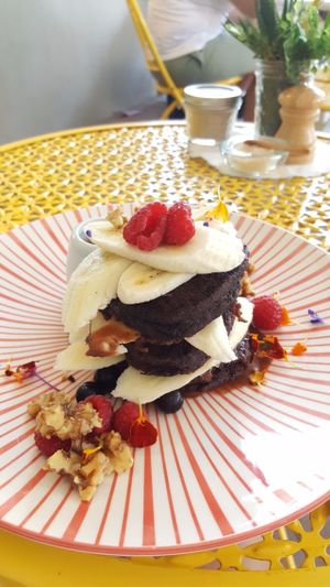 Cacao and buckwheat pancakes with banana and yummy chocolate sauce! at Betty's Bohemian Beach Cafe in Port Douglas