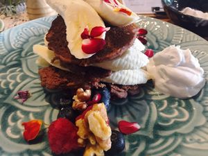 Vegan cacao, vanilla and buckwheat pancakes (with a side of coconut yogurt, cause the standard sauce was too rich for me!).  at Betty's Bohemian Beach Cafe in Port Douglas