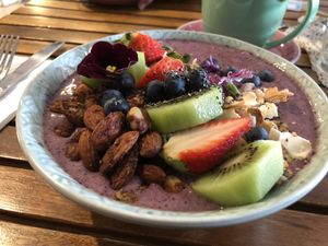 Blueberry Banana and Açaí Smoothie Bowl with Granola at Betty's Bohemian Beach Cafe in Port Douglas
