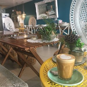 Decaf latte in the beautiful bohemian decor  at Betty's Bohemian Beach Cafe in Port Douglas