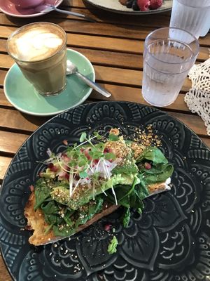Avocado toast and soy latte at Betty's Bohemian Beach Cafe in Port Douglas