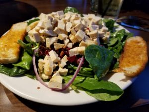 large vegan spinach salad with tofu at Pizza Luce in Roseville