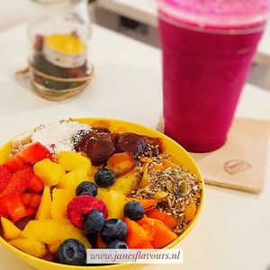 Fresh Açaí bowl and fruit juice at Milk Away in Sevilla
