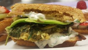 Savory Waffle Sandwich: based on homemade almond milk, cashew chive cream cheese, chickpea omelette at Purple Sprout Conscious Organics in Buffalo Grove