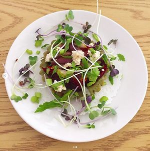 Cashew Basil Raw pizza! So good and SO PRETTY. at Purple Sprout Conscious Organics in Buffalo Grove