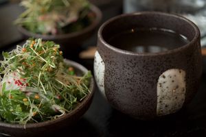 Mushroom consommé  with seaweed salad at Karma Sushi in Aalborg