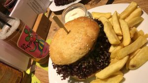 Vegan hamburger with fries at Franz & Willi in Weimar