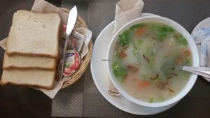 Thai breakfast set with coffee (Khao tom) at Amici Miei Hotel in Phuket