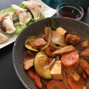 Chicken w cashew nut, & fried dumplings  at Tien Hiang in Paris