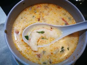 Coconut milk soup with tomatoes and '' prawns" at Tien Hiang in Paris