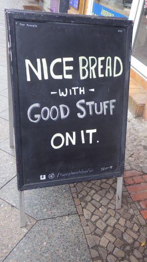 Sandwich board... at Two Planets in Berlin