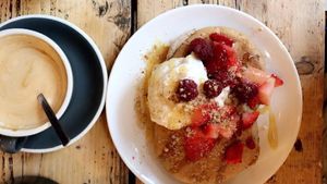 Vegan pancakes with coconut yoghurt, maple syrup, berries and a pecan crumble at Yogism - George's Street Arcade in Dublin