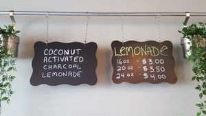 Utopia signs. at Utopia Juice Bar in Pompano Beach