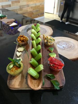 Vegan selection - chickpea curry,  Artichoke with pesto, roasted red peppers and homemade Spicy Homus! at Utopia Juice Bar in Pompano Beach