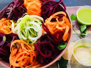 Zucchini Spaghetti: zucchini, carrots, organic spinach, beets & pesto dressing at Utopia Juice Bar in Pompano Beach
