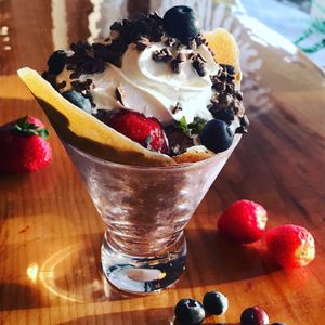 Amazing Cacao Chia Pudding Parfait...Coconut Wrap, Fresh Berries and Whip at Utopia Juice Bar in Pompano Beach