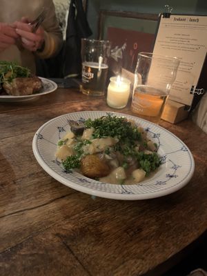 Vegan fricassee with lovage and baked potatoes  at Lygtens Kro in Copenhagen