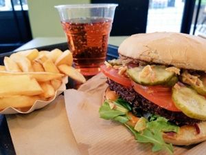Swing burger and fries at Swing Kitchen - Operngasse in Vienna