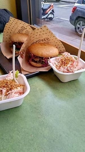 Burgers with coleslaw salad  at Swing Kitchen - Operngasse in Vienna