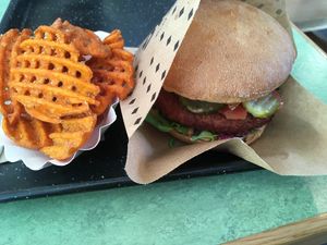 Burger with sweet fries at Swing Kitchen - Operngasse in Vienna