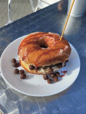 White chocolate and jam doughnut (i asked for no whipped cream) at Ruta 42 in Lhospitalet De Llobregat