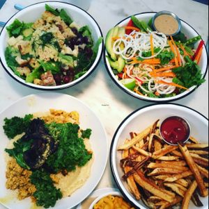 Chickpea ";tuna"; salad, pad Thai salad, French fries, southern grit bowl and Mac n' ";cheese"; at Gnome Cafe in Charleston
