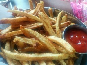 deliciously crunchy basket of fries with ketchup at Gnome Cafe in Charleston