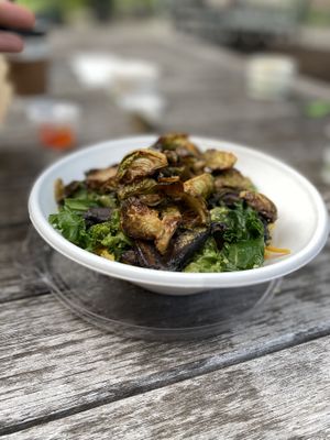 Southern Grits with a side of Brussel Sprouts on top! at Gnome Cafe in Charleston