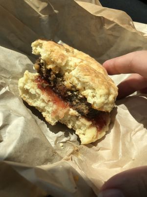 Biscuit with sausage, strawberry jelly and cheese at Gnome Cafe in Charleston