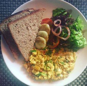 scrambled tofu & wholegrain bread  at Jalus Vegan Kitchen in Hanoi