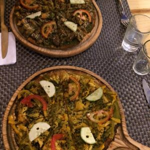 Pizzas that are quite original and very tasty. The pesto pizza wins. at Jalus Vegan Kitchen in Hanoi