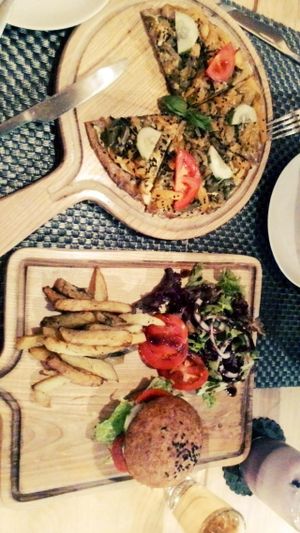 blueberry smoothies, sweet potato pizza and tofu burger at Jalus Vegan Kitchen in Hanoi
