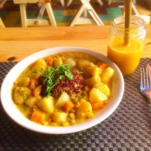 potato and chickpea curry with red rice at Jalus Vegan Kitchen in Hanoi