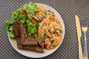 Scrambled tofu with salad and bread for breakfast at Jalus Vegan Kitchen in Hanoi